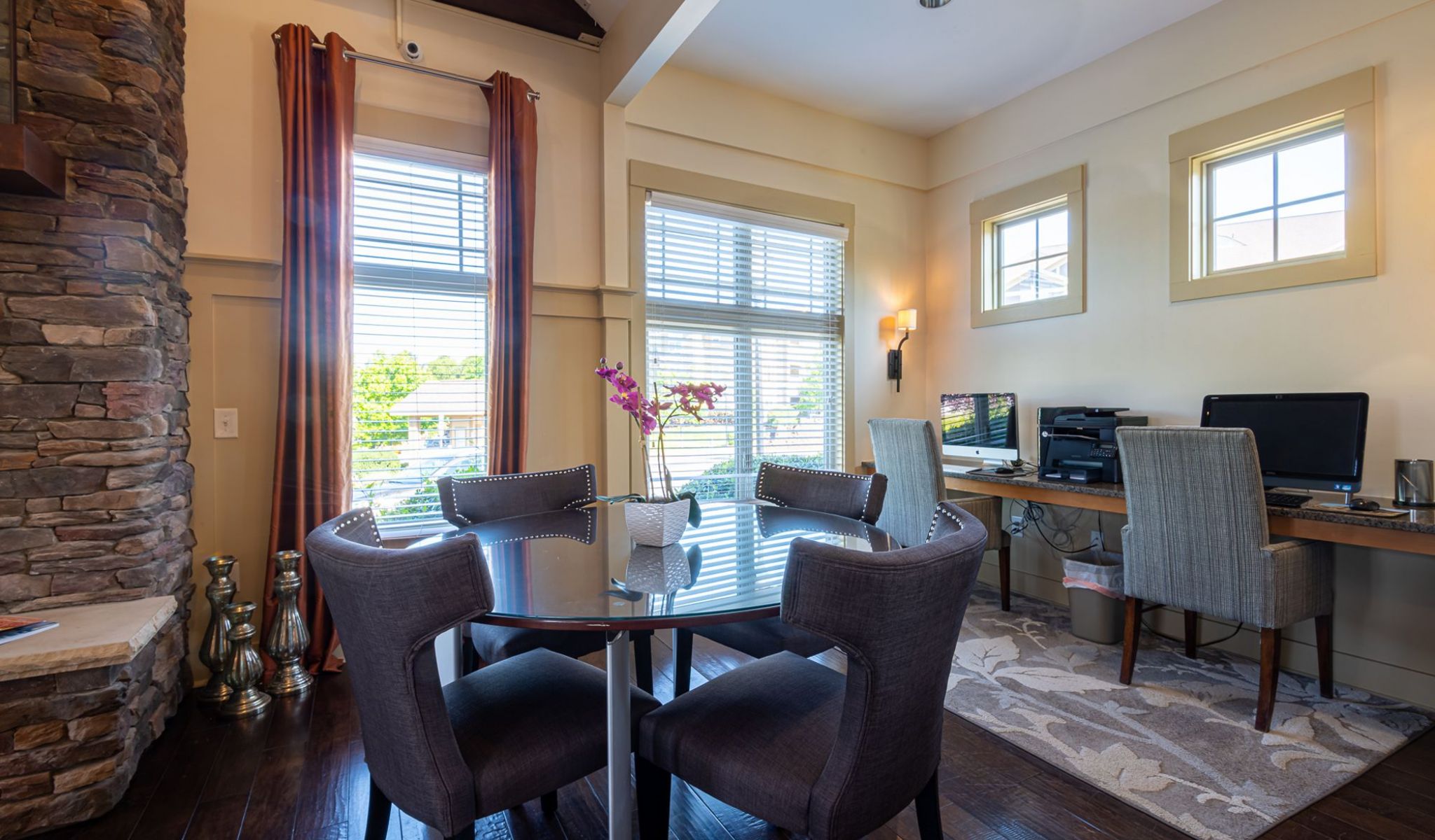 Cosgrove Hill at Chapel Hiil, NC. Dining room with wooden table and chairs, set for four people.