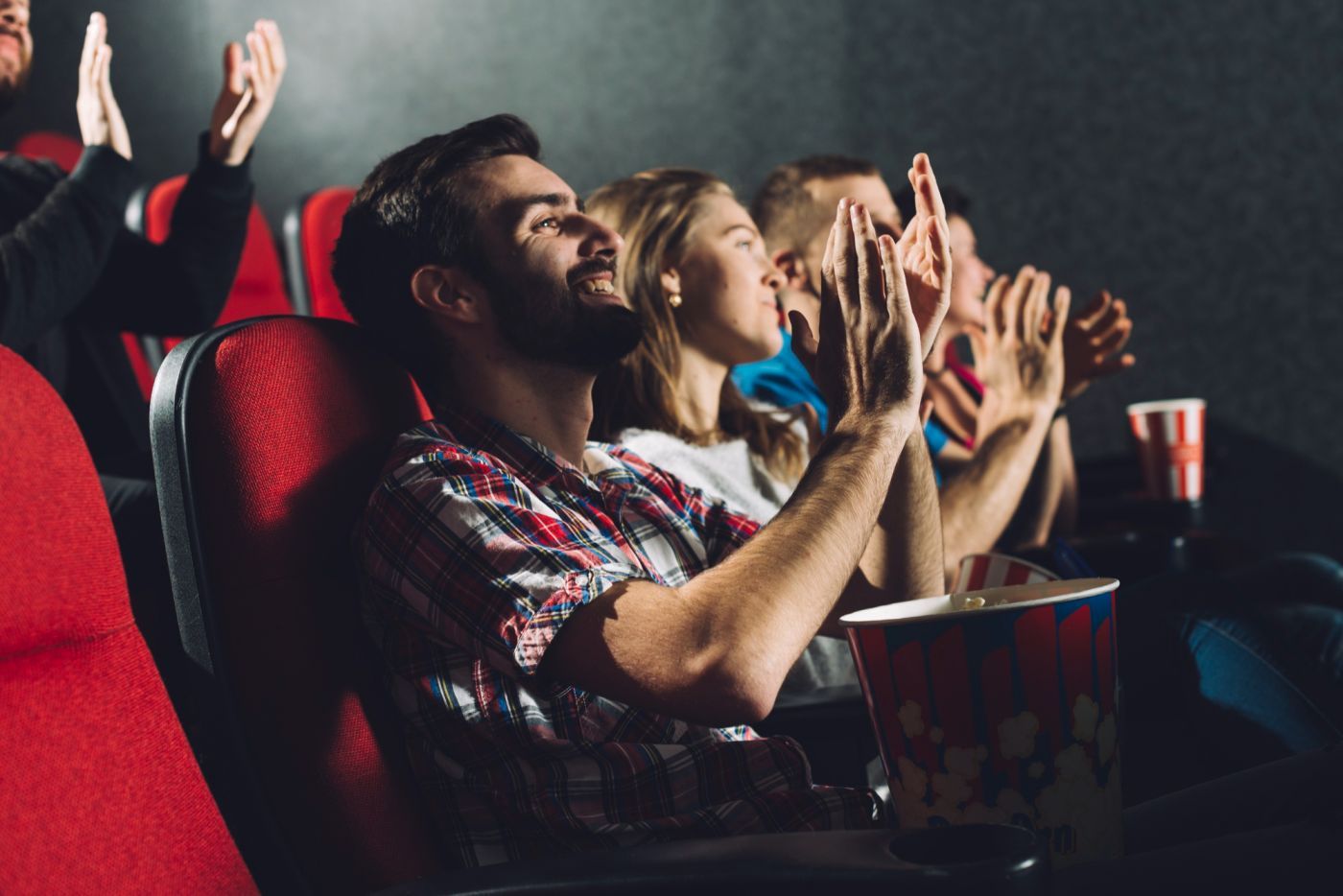 Cosgrove Hill at Chapel Hiil, NC. A group of individuals seated in a theater, focused on the screen as they watch a movie.