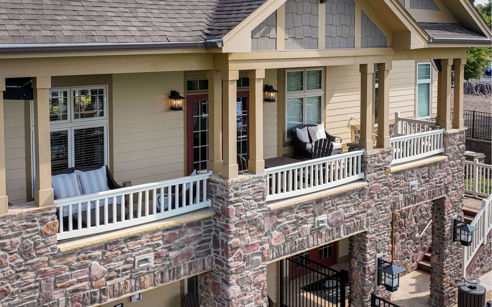 Cosgrove Hill at Chapel Hiil, NC. Home exterior featuring balcony and patio, set against a backdrop of nature.