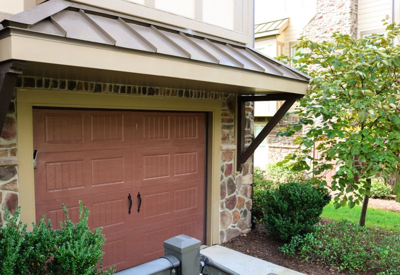 Cosgrove Hill at Chapel Hiil, NC. Garage with white SUV parked and bike hanging on wall.
